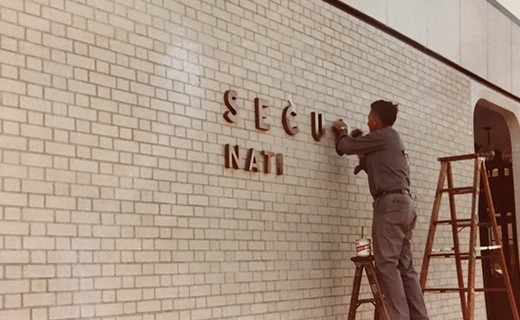 Installing signage at early branch